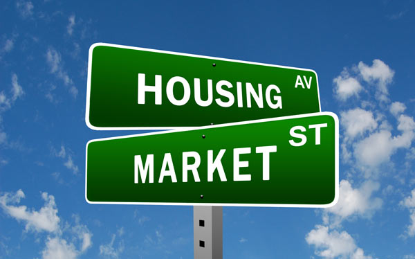 Housing market road sign